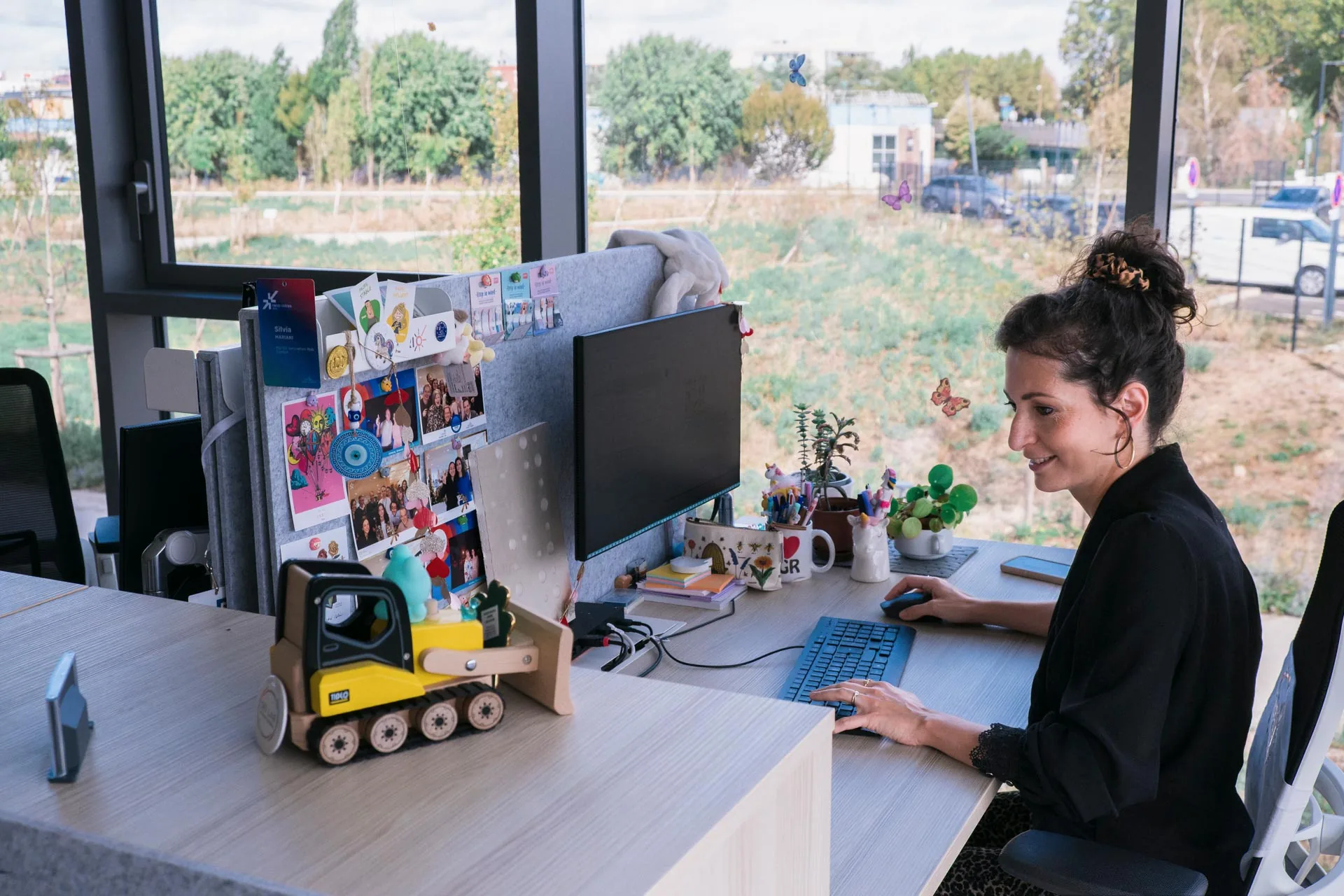 Silvia Mariani, managing director of the Saint-Gobain Innovation Hub Europe, at her desk, photographed for Microsoft